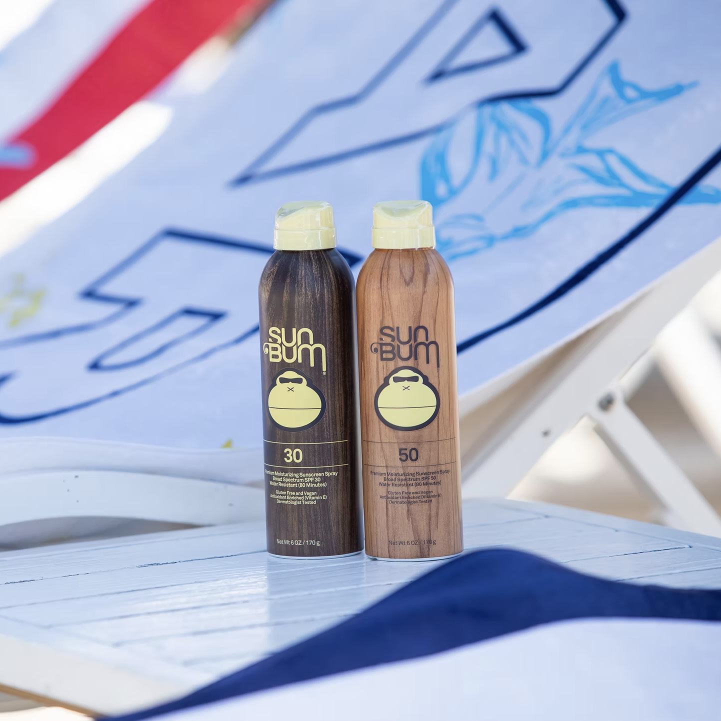 Sun Bum sunscreen bottles displayed on a Kargo-branded lounge chair