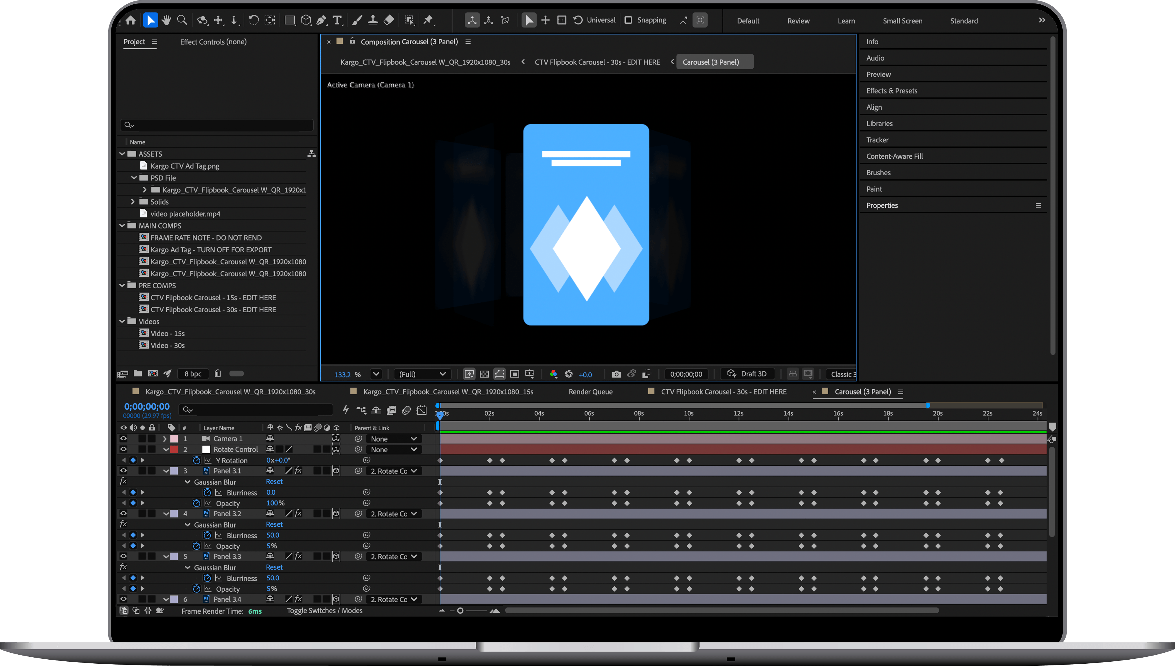 Laptop screen showing a video editing software interface with multiple timeline tracks, keyframes, and a central preview panel displaying a blue and white abstract geometric shape.