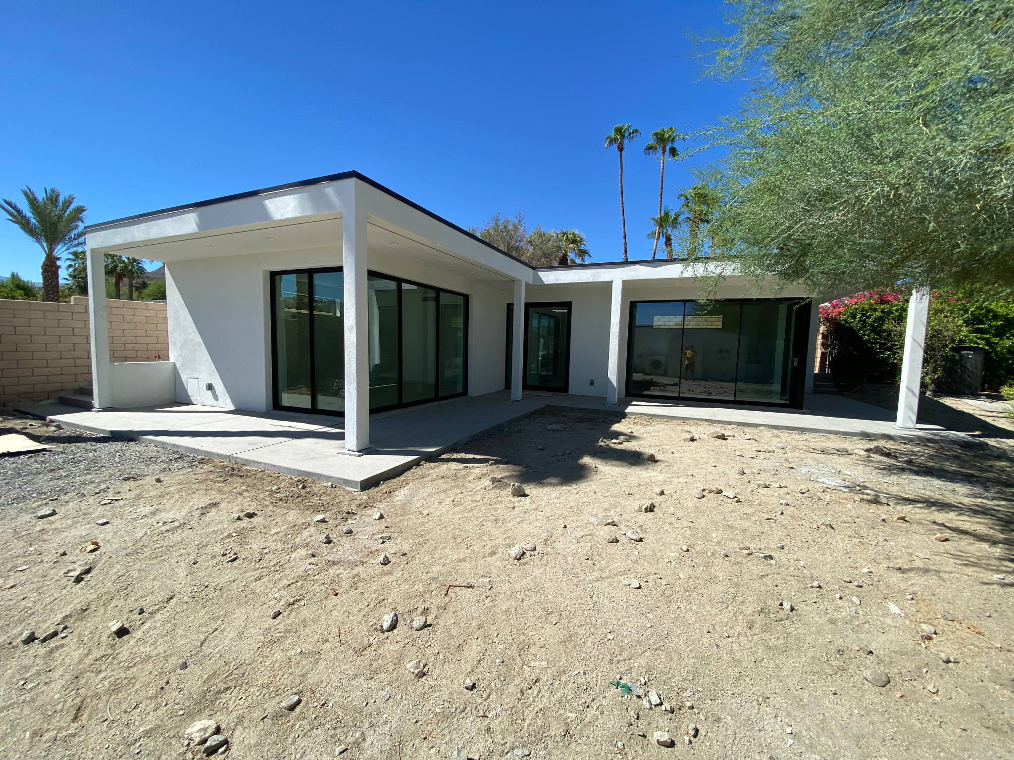 Actual Rancho Mirage casita courtyard exterior at completion of TKG's contracted work, before owner landscaping