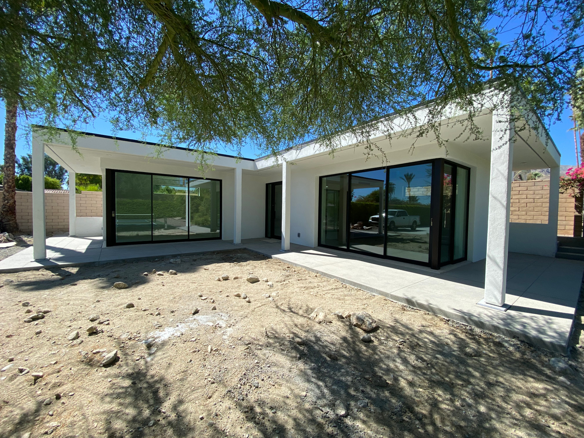 Actual Rancho Mirage casita exterior from the opposite courtyard angle, before owner landscaping