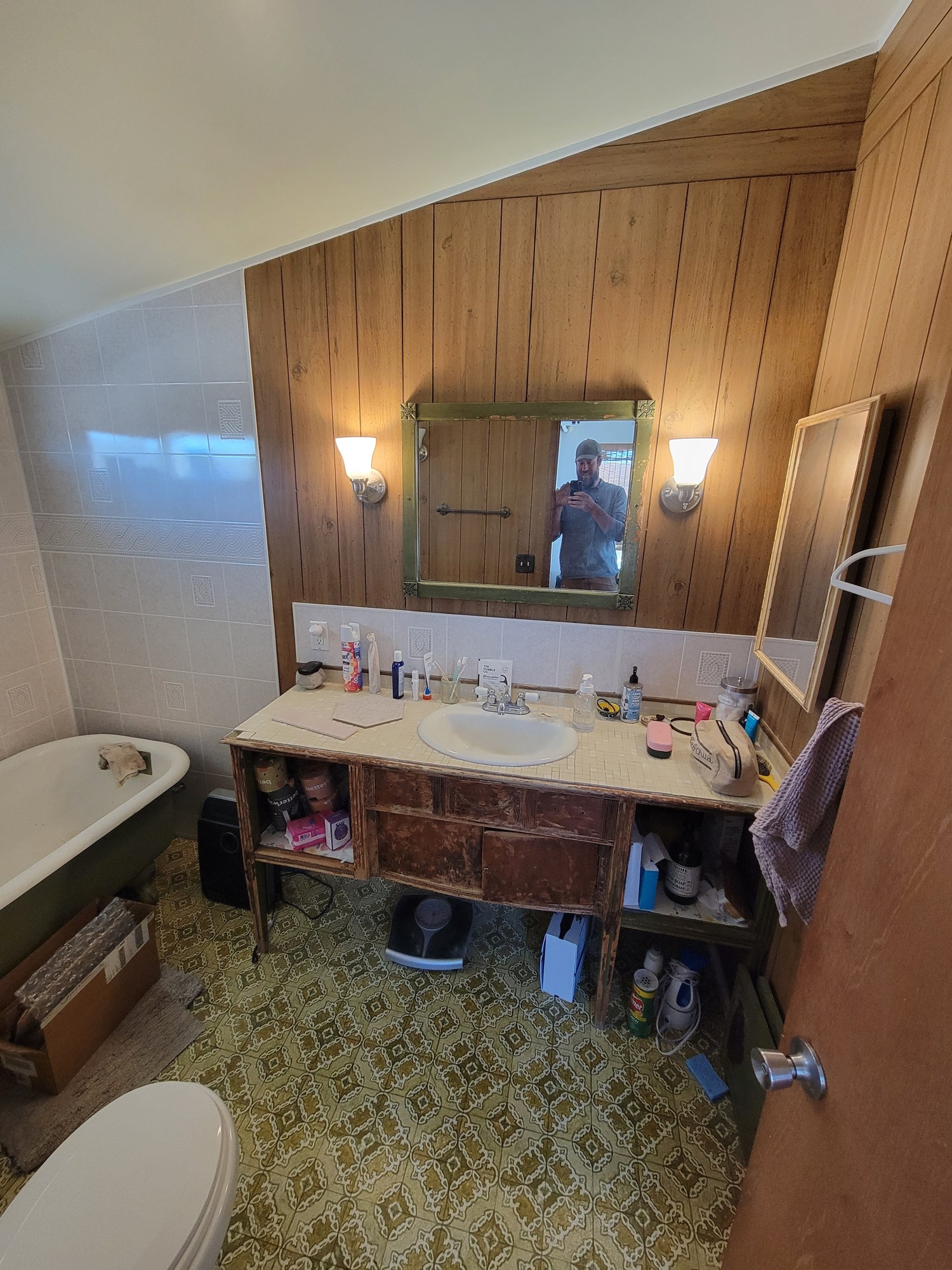 Original dated bathroom before the Landers remodel.