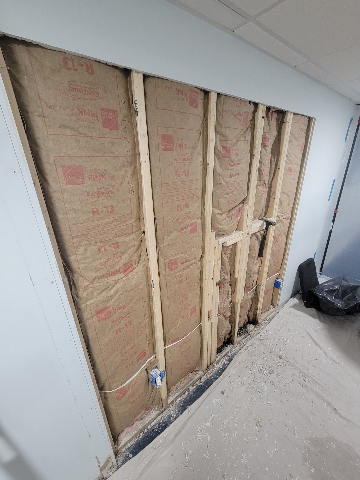 Basement wall opened during investigation of water intrusion in Greenville.