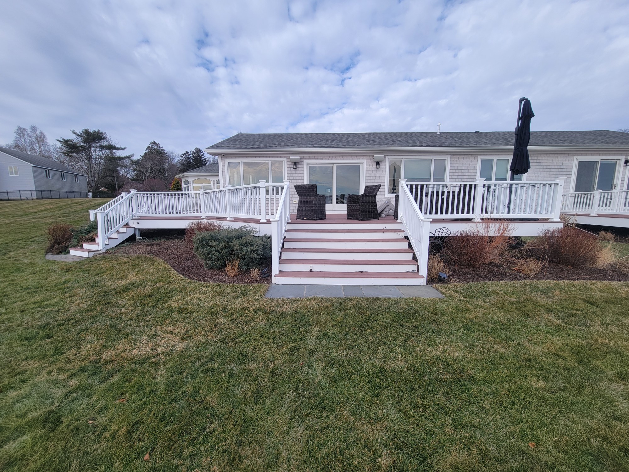 Existing elevated deck and stairs before the Warwick Neck overhaul.