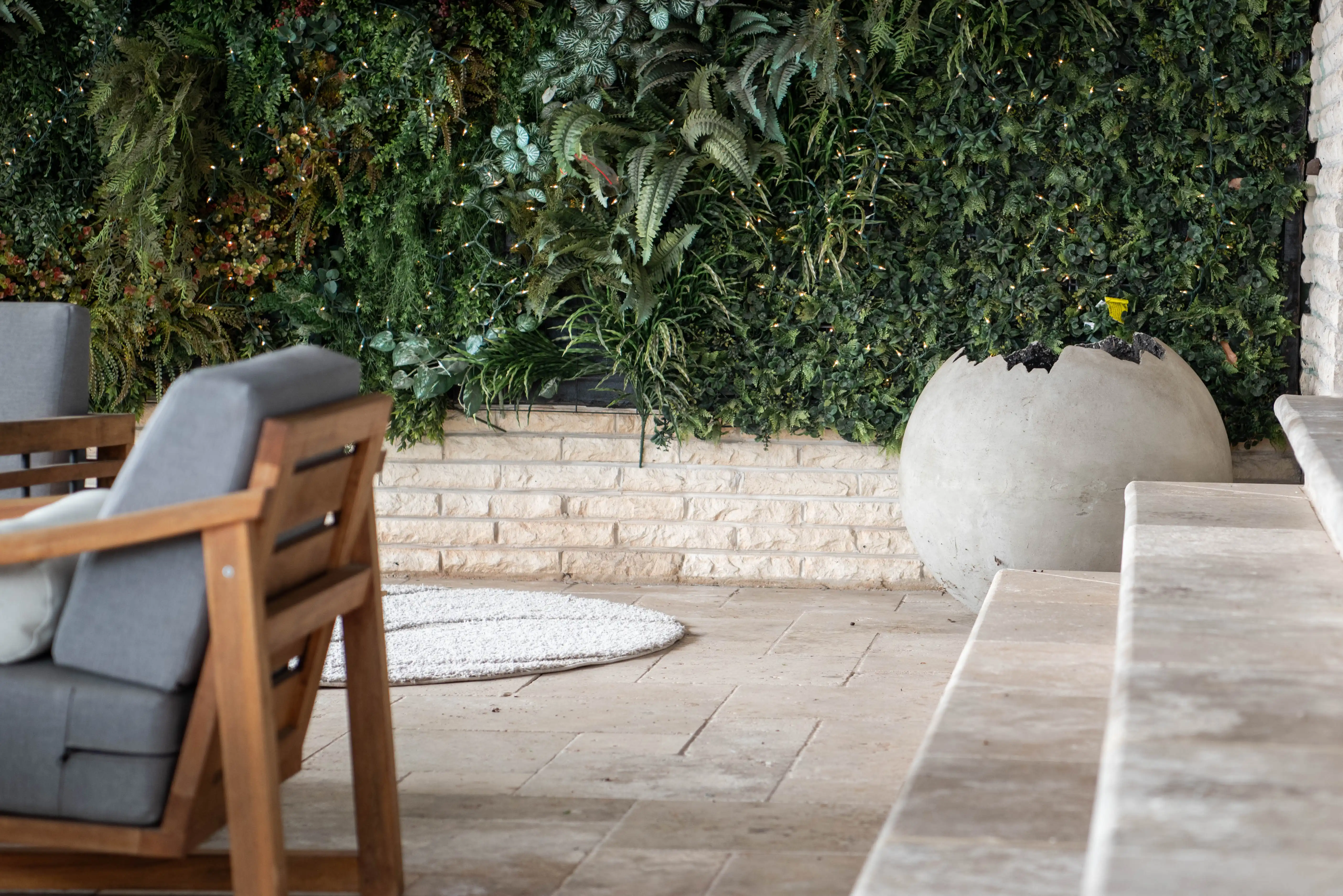 Modern interior with abstract egg sculpture and green wall