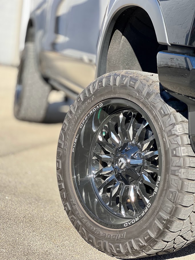 Fuel Off-Road wheel with an all-terrain tire on a pickup truck