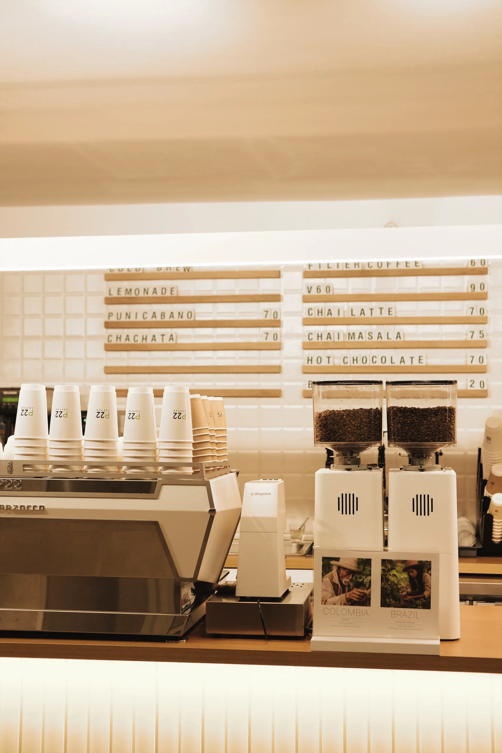 Coffee equipment and takeaway cups on a café counter