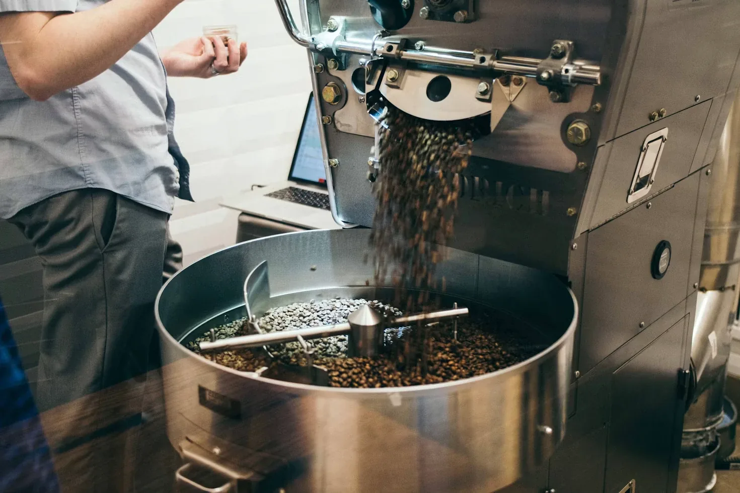 Roaster working with coffee beans
