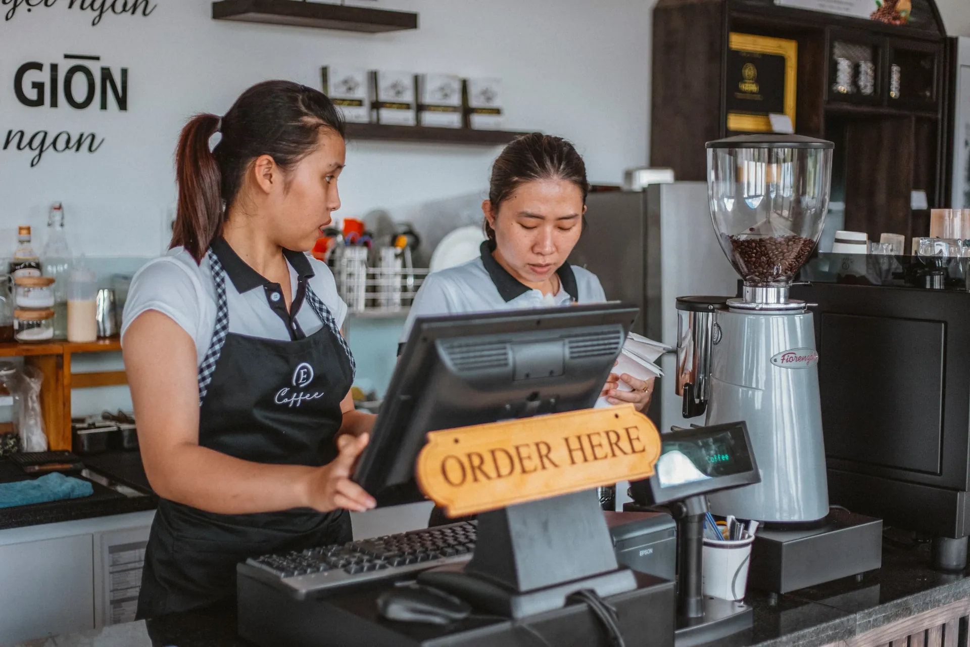 Café team preparing coffee