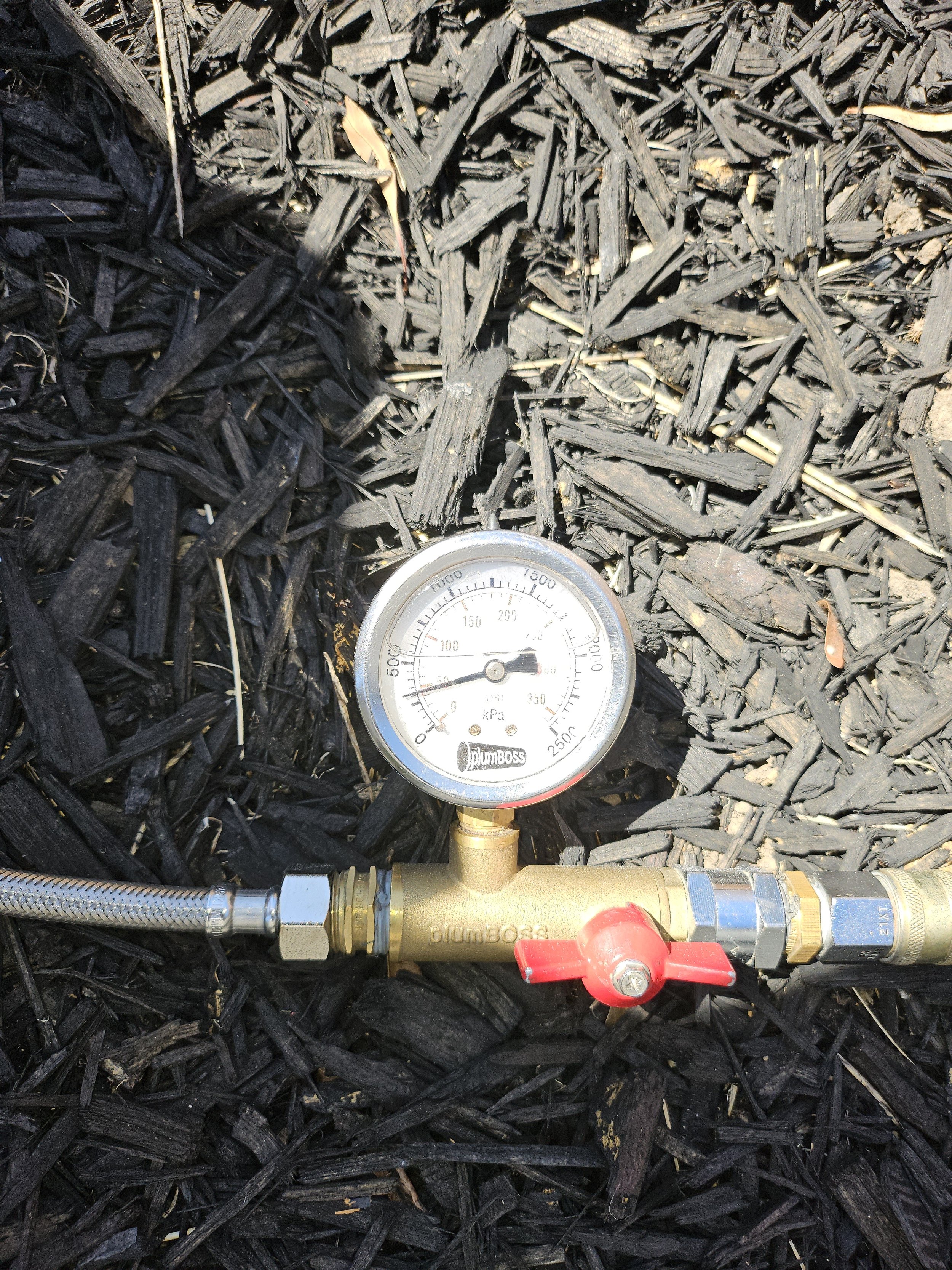 Pressure test gauge fitted to a water line