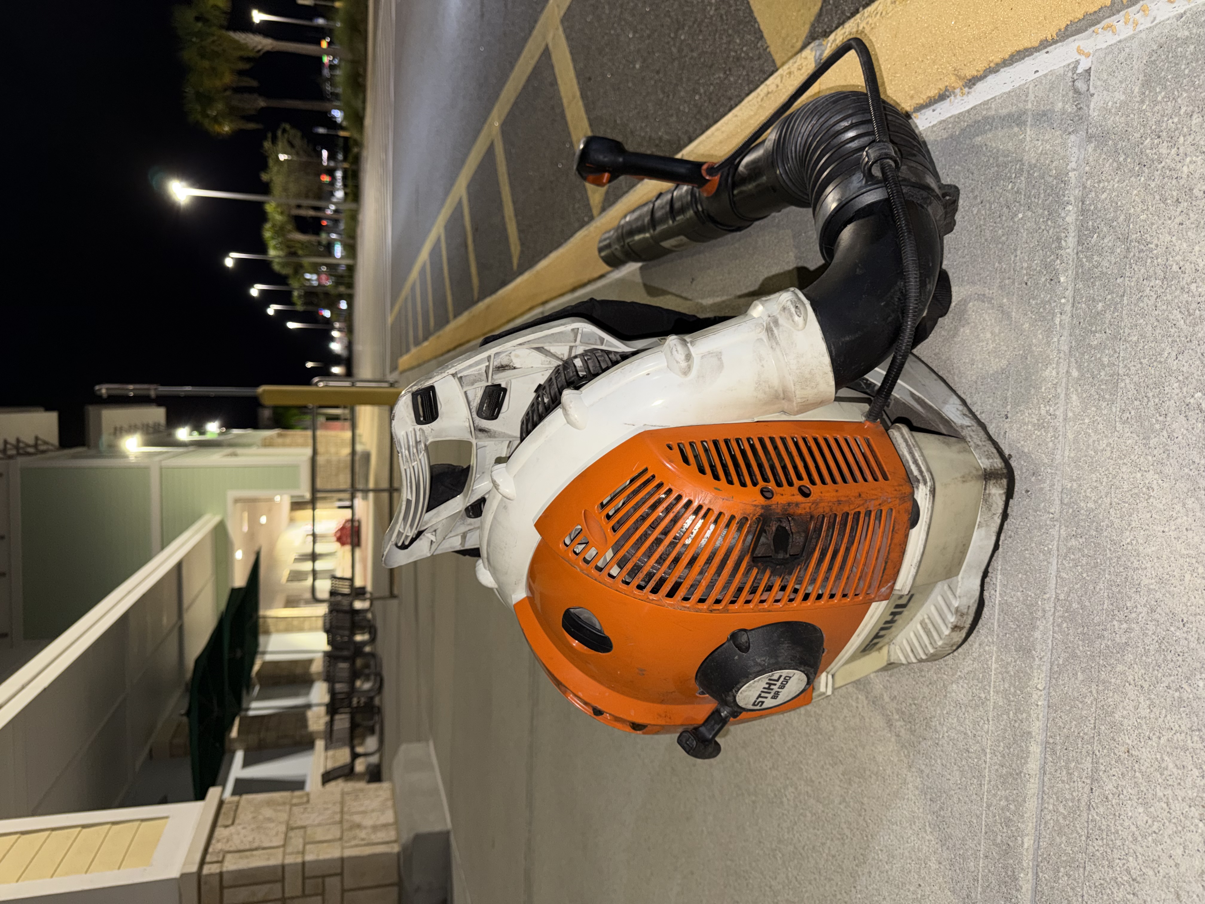 Richards Maintenance backpack blower for sidewalk and curb blowing