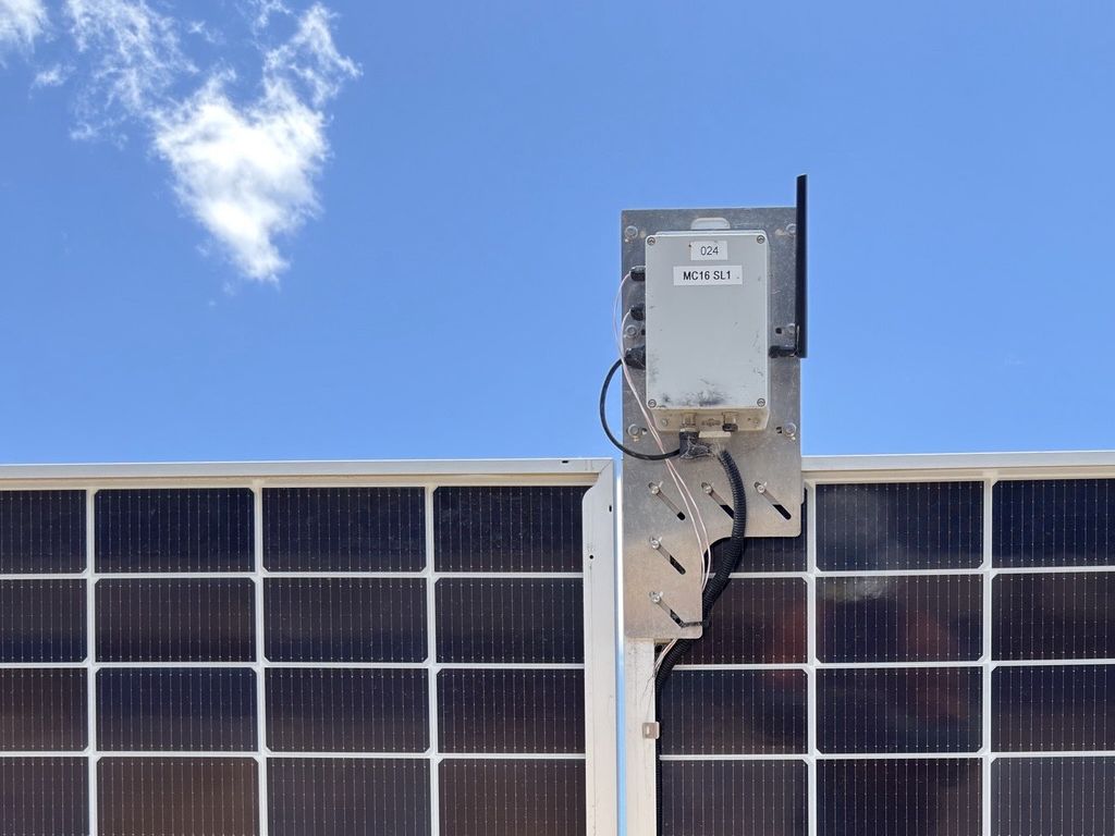 PulseBee sensor mounted on a solar tracker row