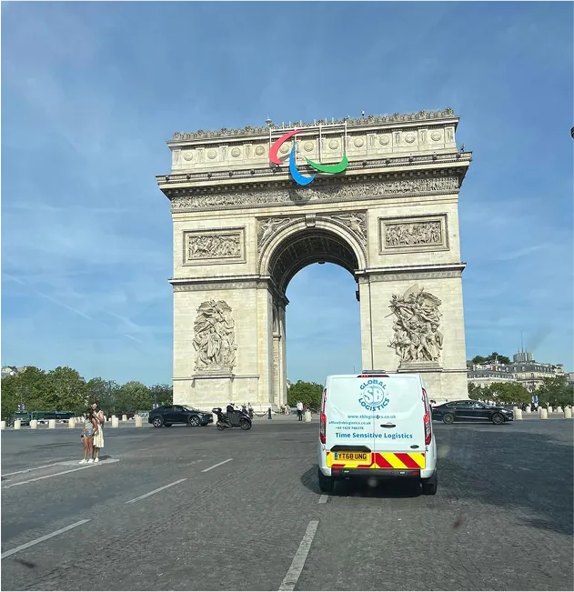 SB Global Logistics van parked near the Arc de Triomphe in Paris