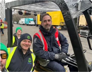 SB Global Logistics team member handling freight for events
