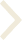 White chevron arrow pointing right on a transparent background.