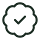 Dark green circular badge with a checkmark in the center, symbolizing approval or verification.