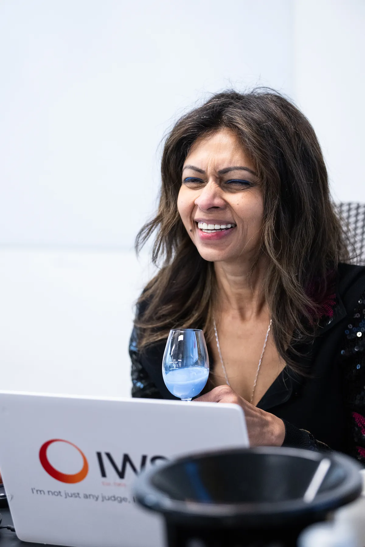 Ruchira Neotia laughing while judging at the IWSC
