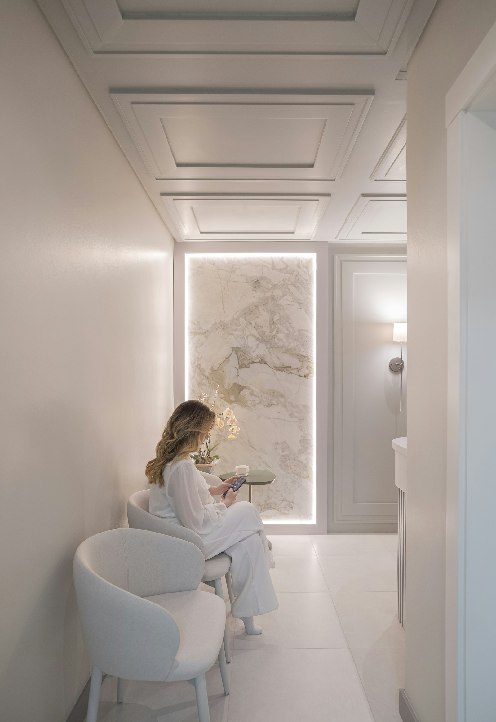Patient waiting in a bright, modern private clinic