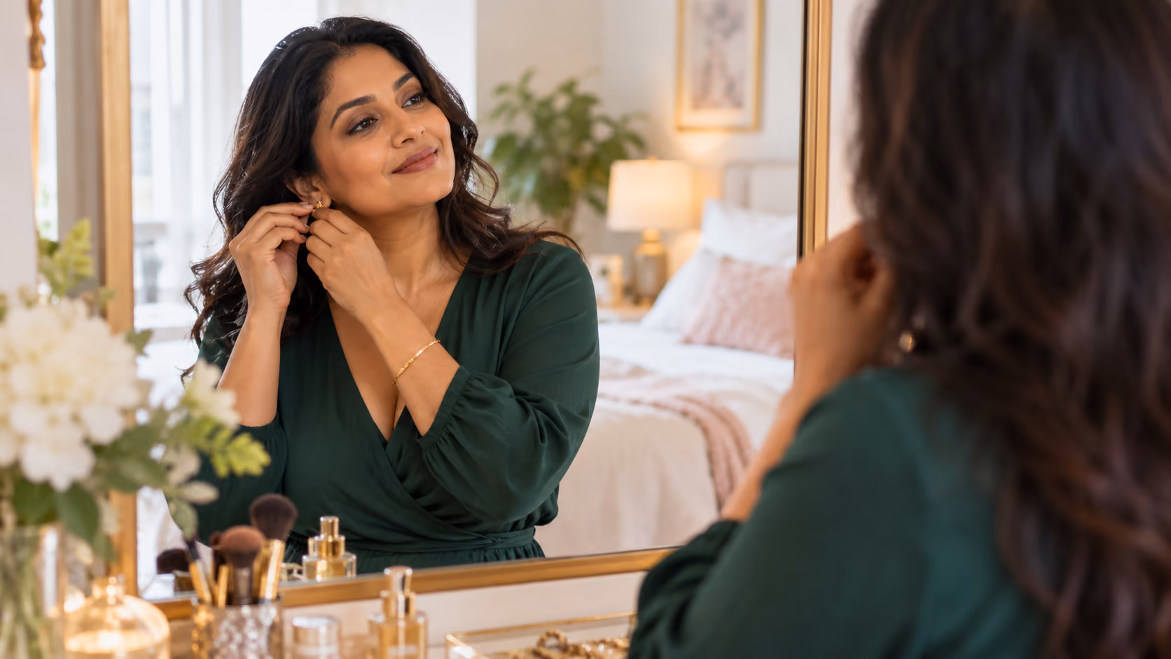 Woman getting ready in front of a bedroom mirror.