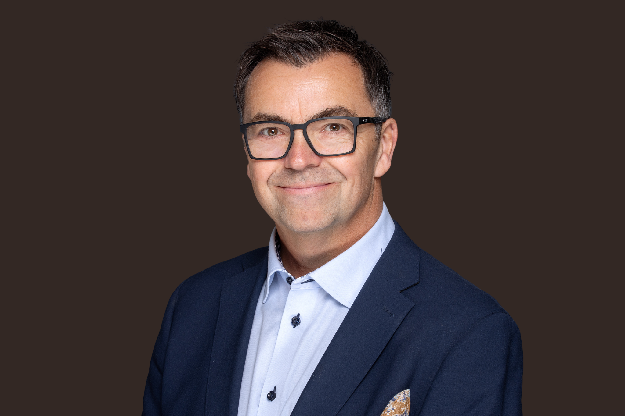 Portrett av eiendomsmegler Ole-Ivar Bjørkamo