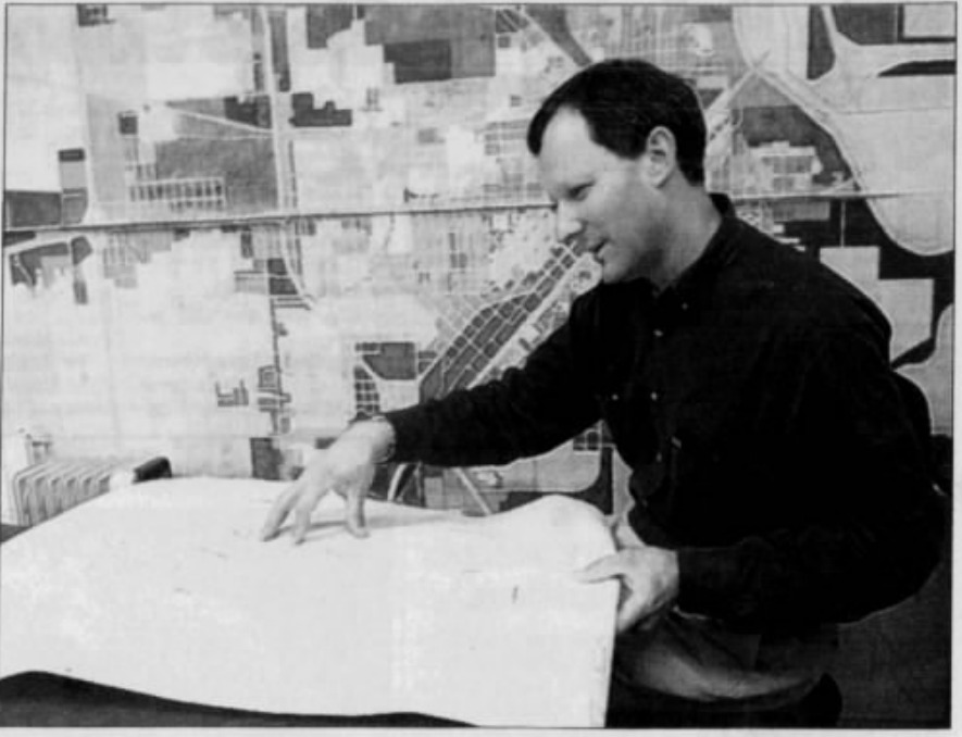 Andy Stetelman at work in the family business, Hattiesburg American, November 7, 2003.