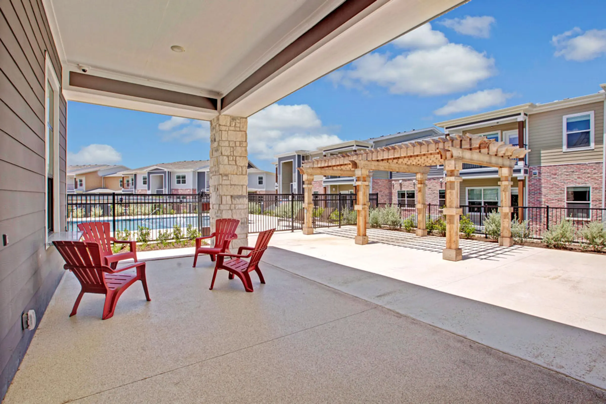 Outdoor lounge with view of pool