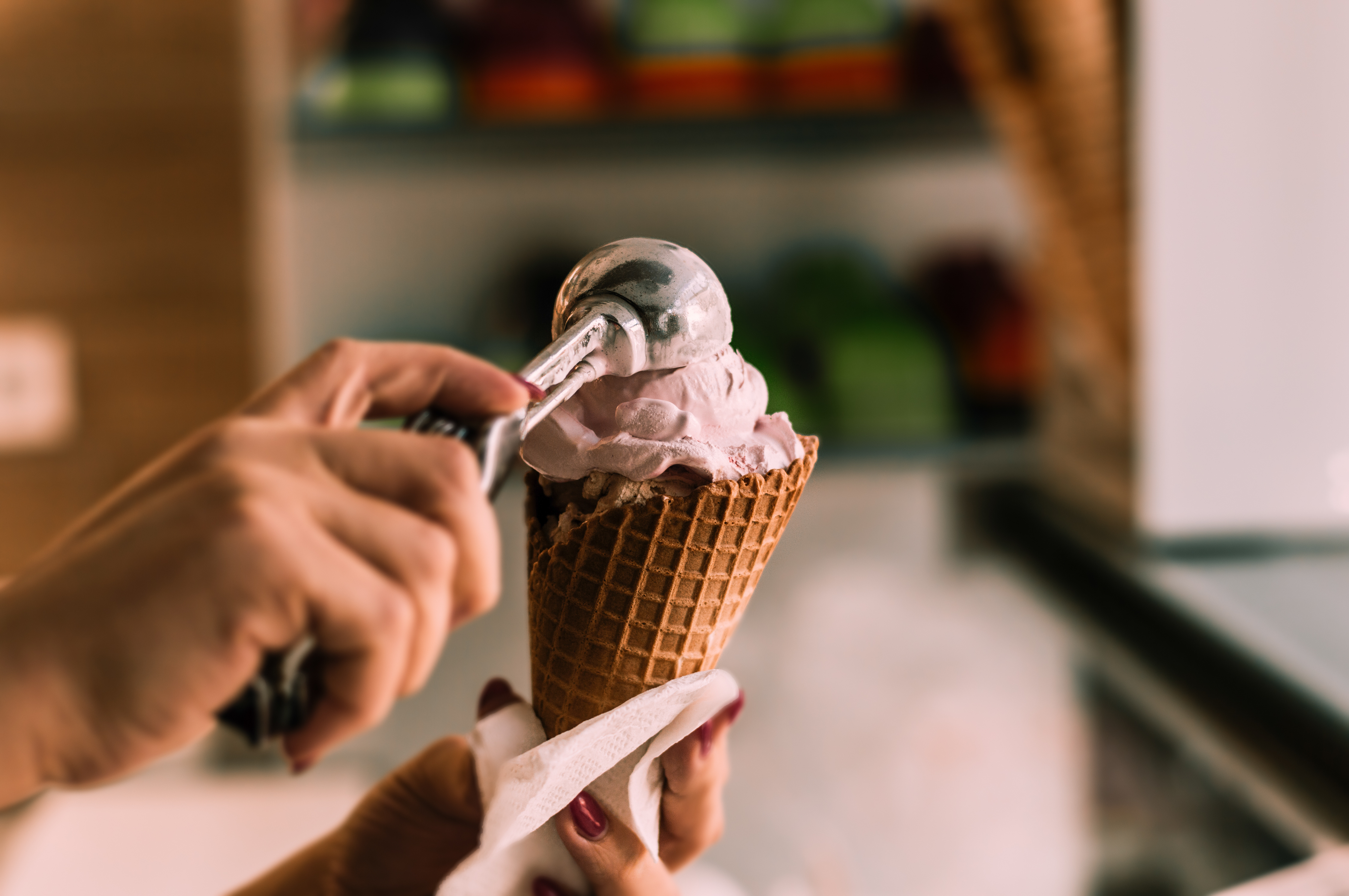 Scoop of ice cream in cone stock photo