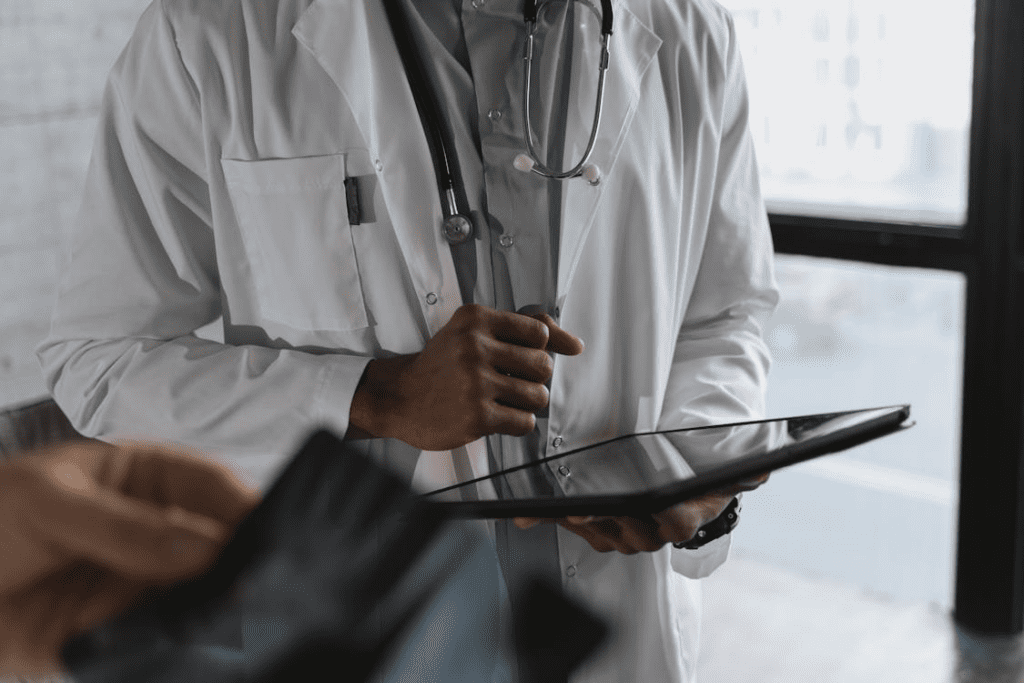 doctor holding an ipad