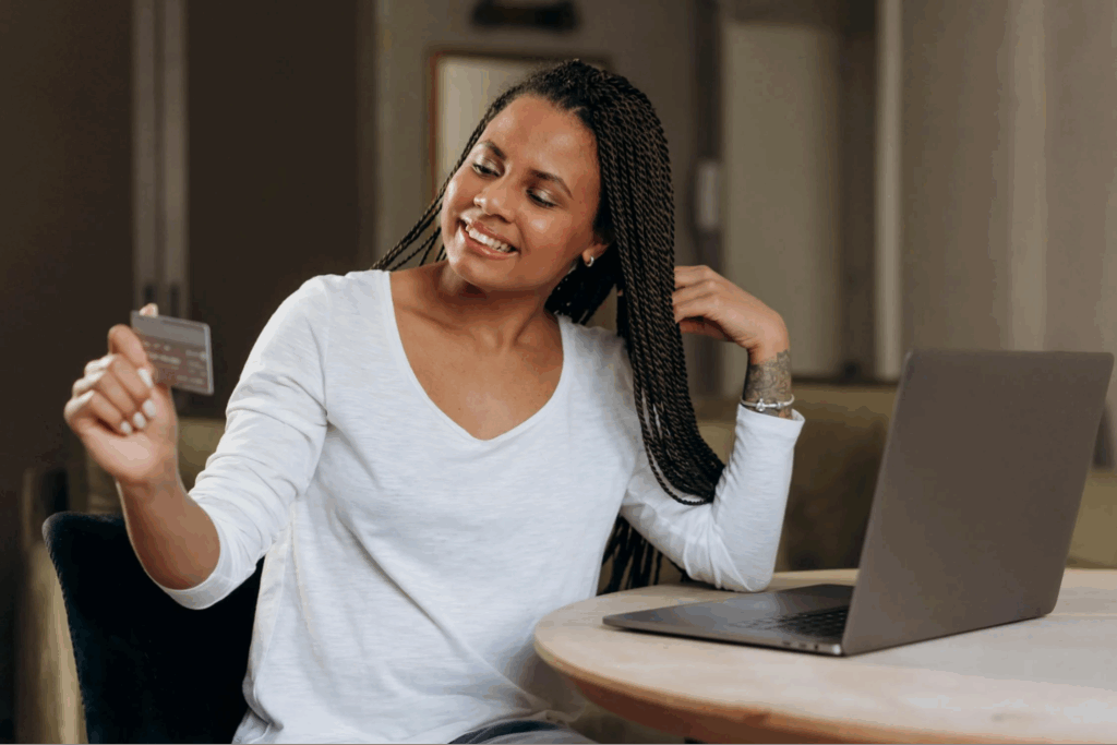 Woman in White Long Sleeve Shirt Sitting on Chair