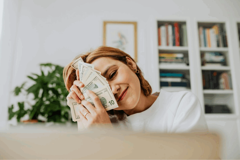 Woman Embracing Money