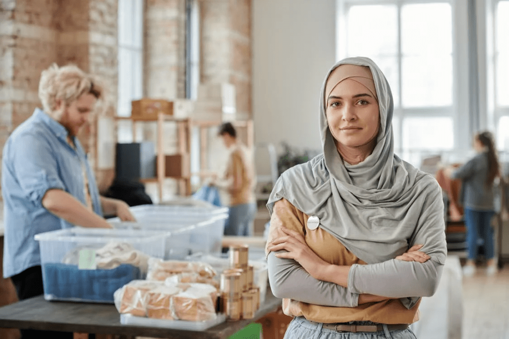 oman in a hijab posing with her arms crossed