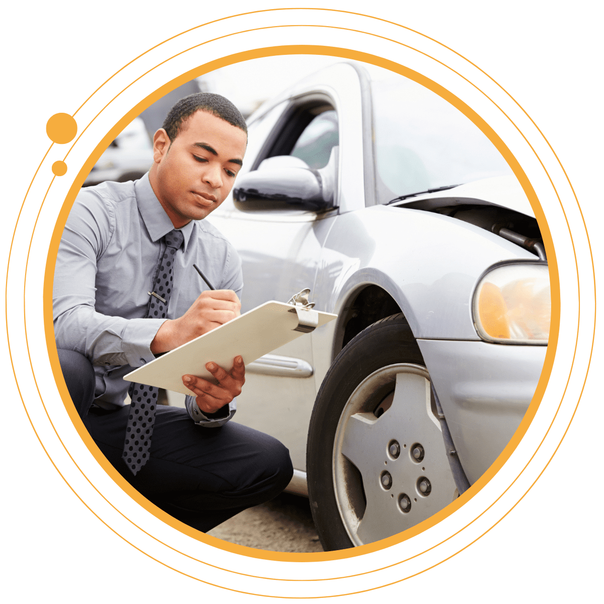 Insurance agent checking a car and taking notes