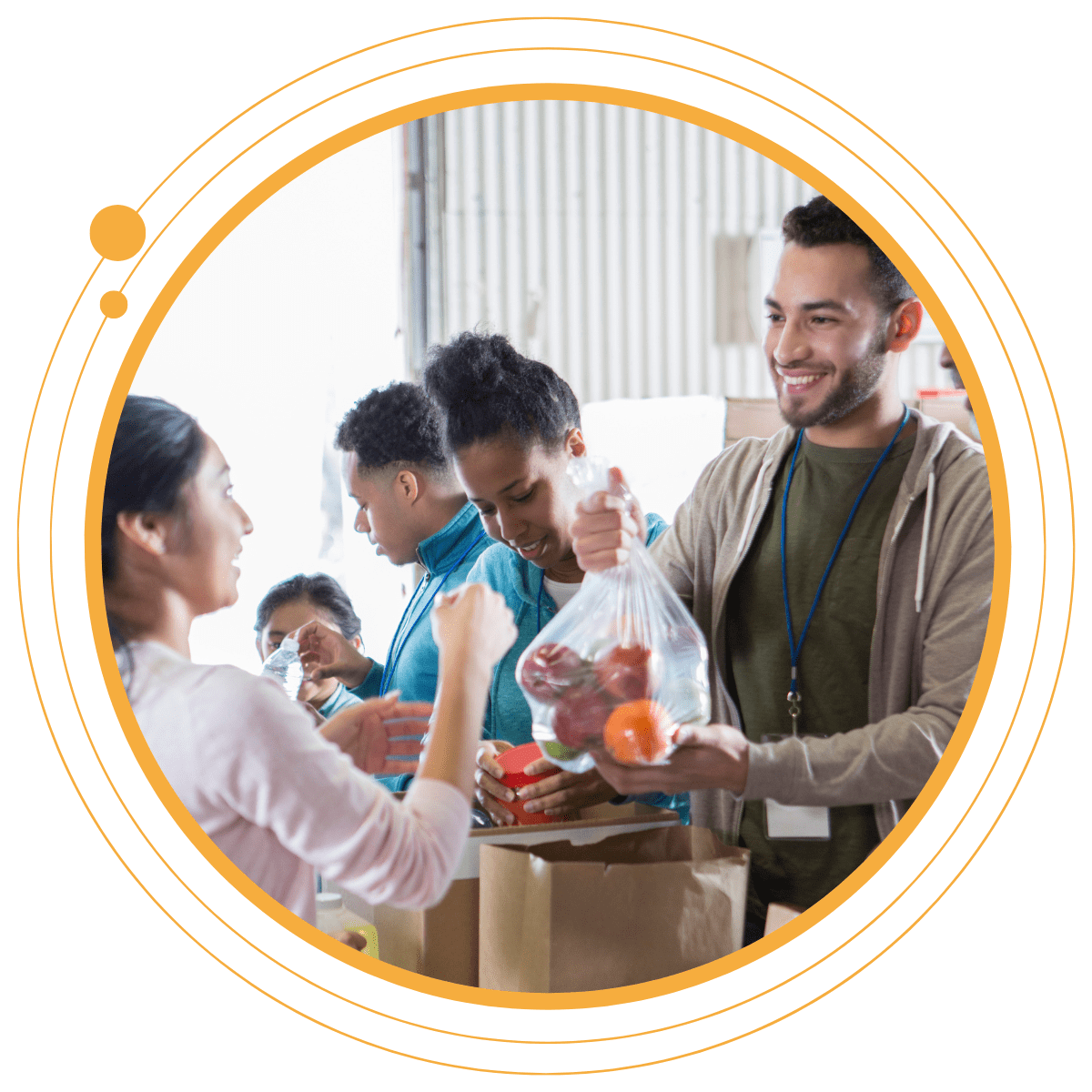 Volunteers handing out groceries at a community food drive