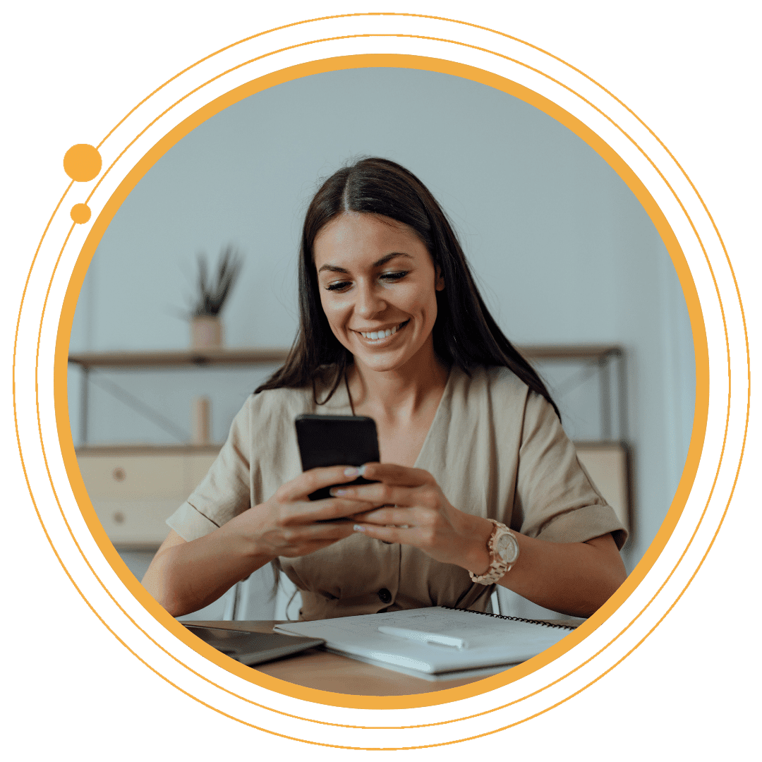 Smiling woman checking her pay on her phone