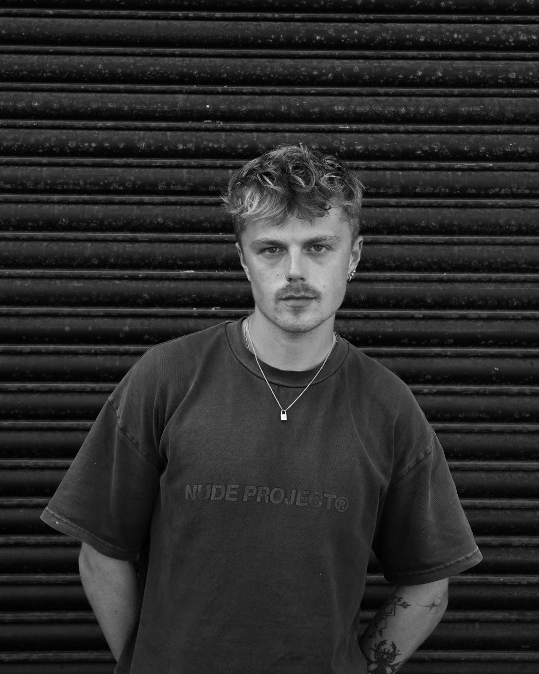Portrait of James West, tattoo artist at SANS PATRIE/ STUDIO