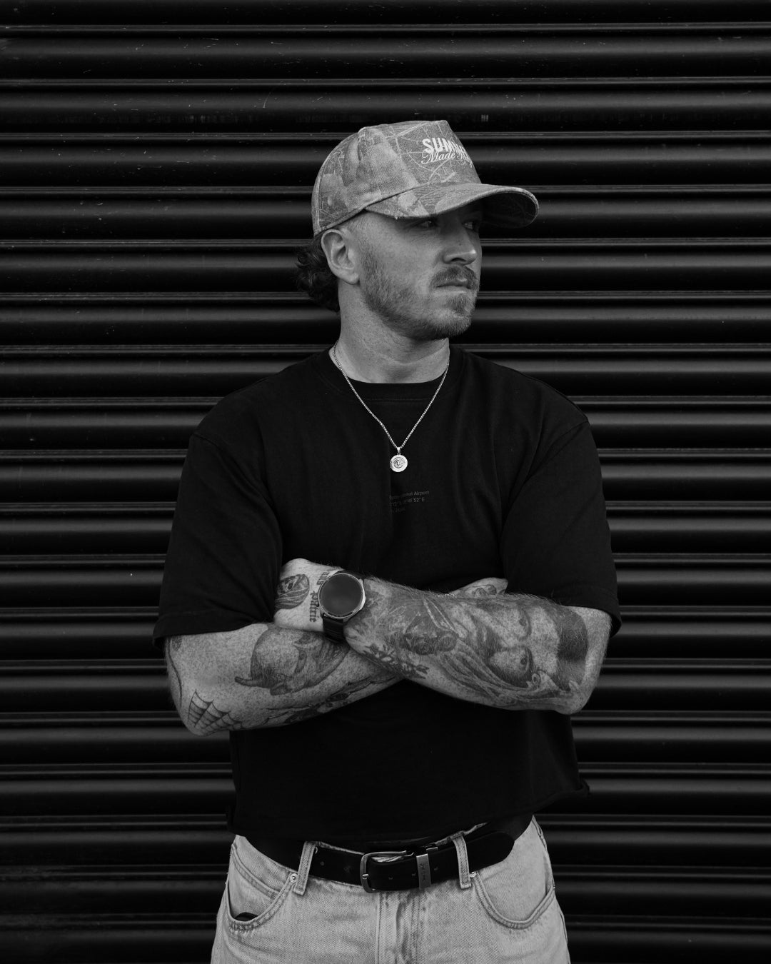 Portrait of Ben Miller, tattoo artist at SANS PATRIE/ STUDIO