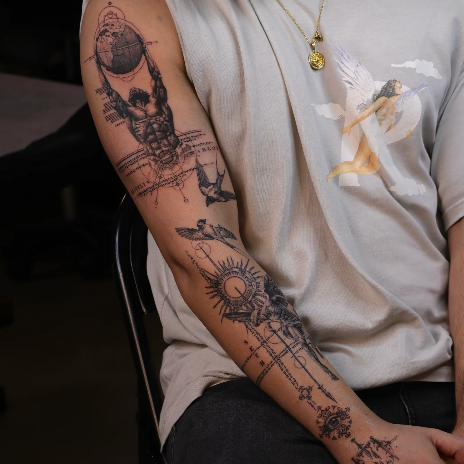 Conceptual sleeve tattoo on the arm by Alfie Watson at SANS PATRIE/ STUDIO