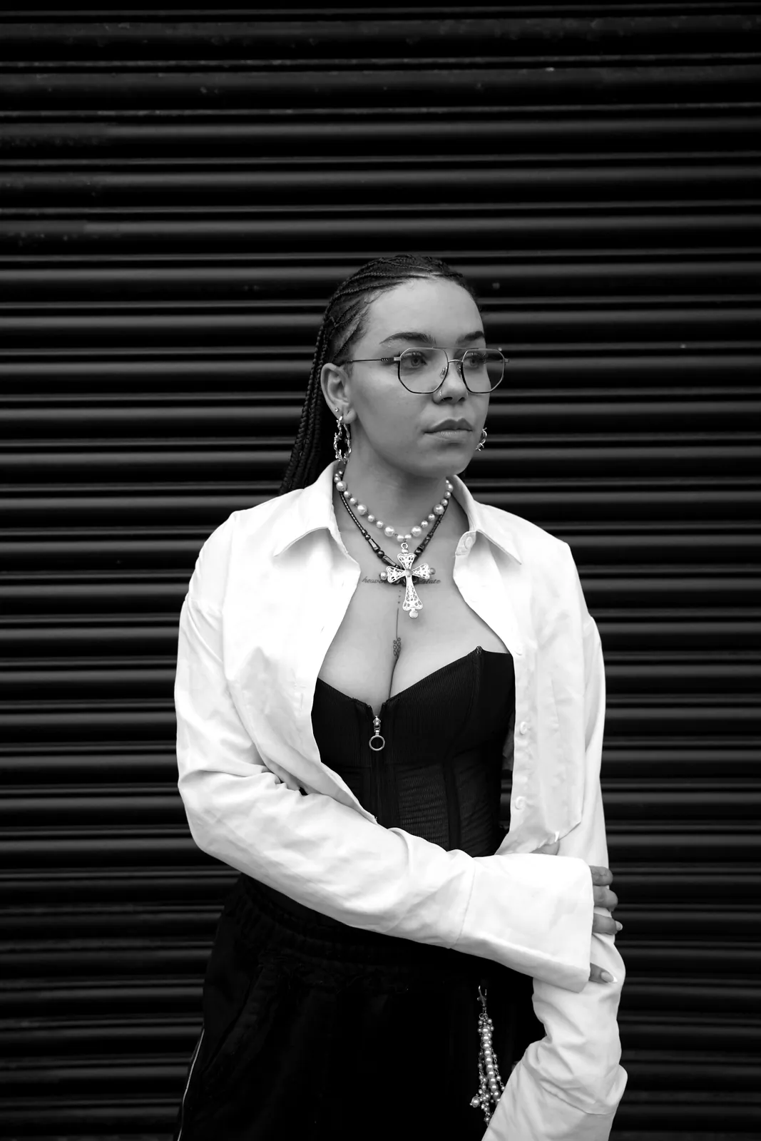 Portrait of Isla Ronise, tattoo artist at SANS PATRIE/ STUDIO
