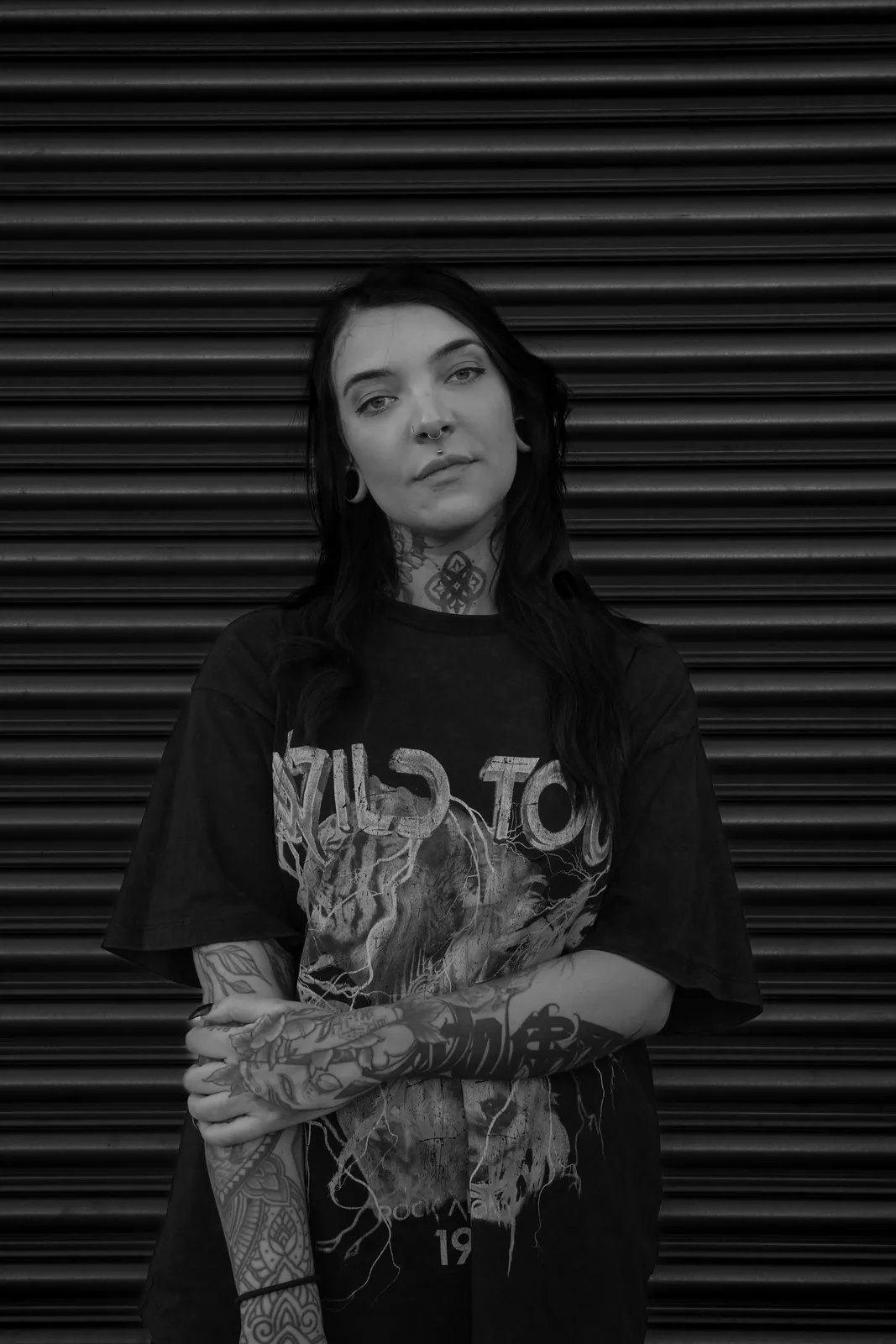 Portrait of Kayla Devlin, tattoo artist at SANS PATRIE/ STUDIO