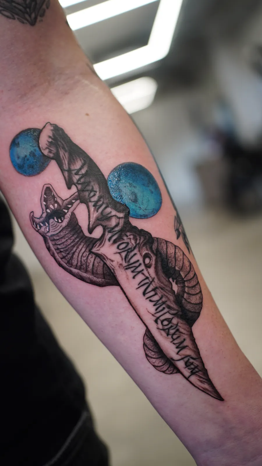 Colour dagger and snake forearm tattoo by Draco at SANS PATRIE/ STUDIO