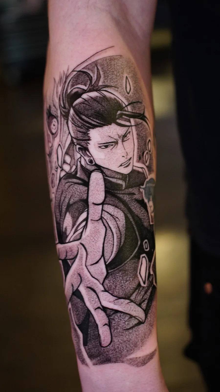 Black and grey anime character forearm tattoo by Draco at SANS PATRIE/ STUDIO
