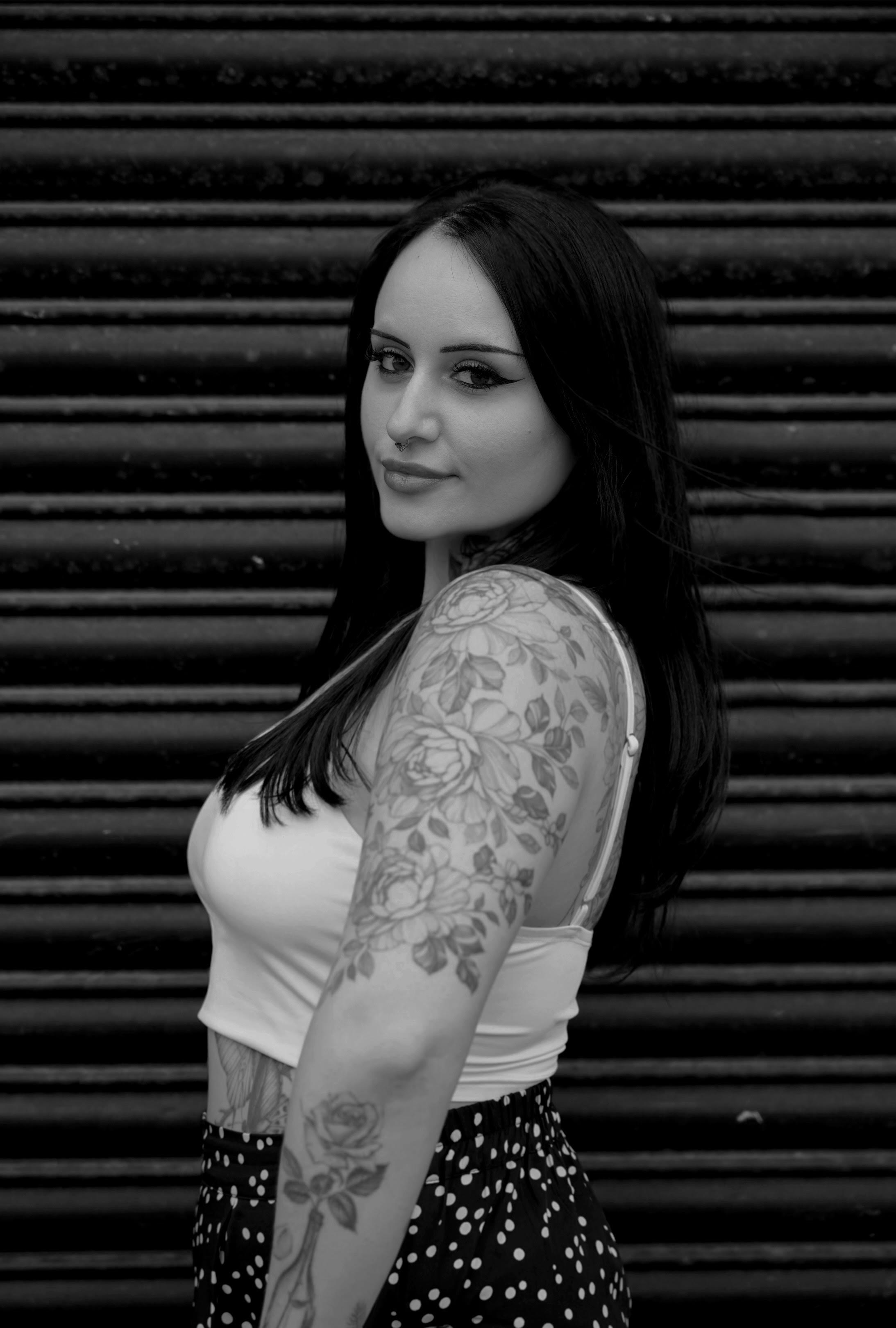 Portrait of Charlotte Glatt, tattoo artist at SANS PATRIE/ STUDIO
