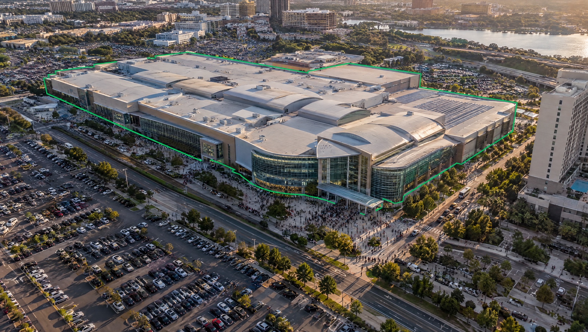 Aerial view of a busy convention center outlined by a green geofence