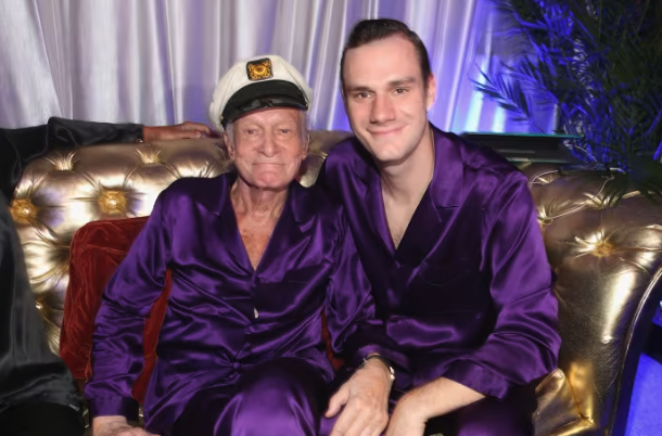 Hugh Hefner and Cooper Hefner at the Playboy Mansion in 2014