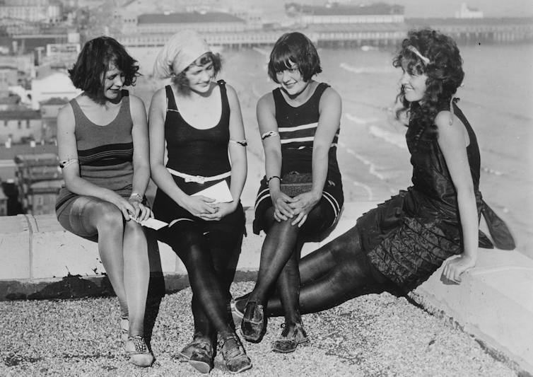 Four young women on a roof in the 1920s