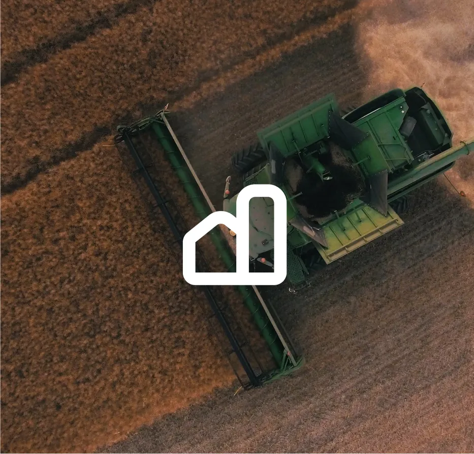 Aerial view of a harvester with the Farm Global icon