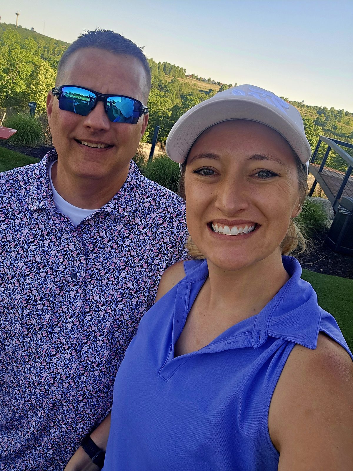 Trisha and her husband on the golf course