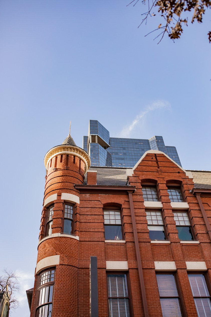 A historic brick building in a city