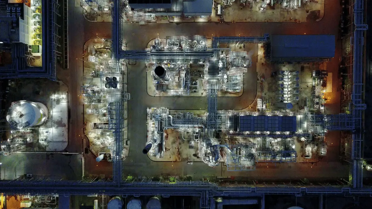 Aerial view of an industrial processing plant at night