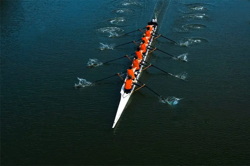 Rowing team moving in unison