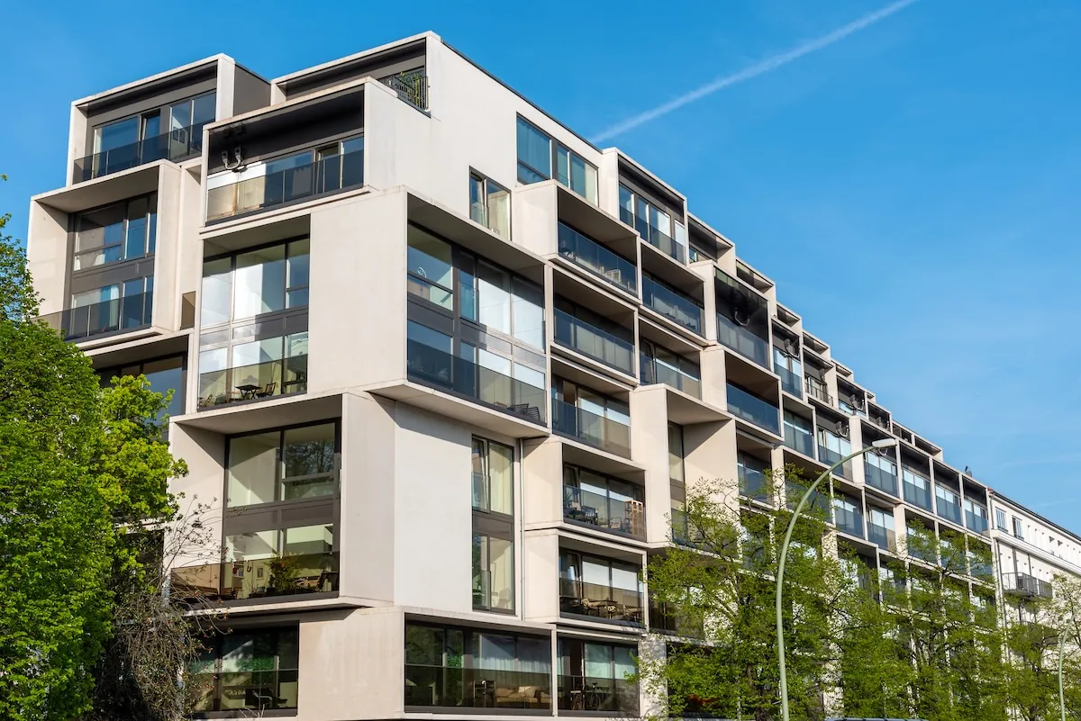Newly completed mid-rise apartment building with balconies